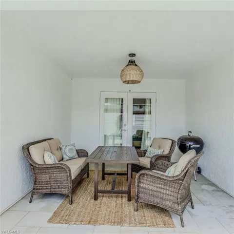 View of patio / terrace with an outdoor living space and french doors