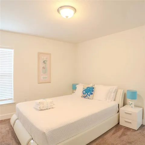 Bedroom featuring carpet floors