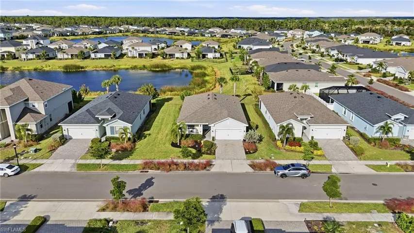 Aerial view of residential area with a nearby body of water