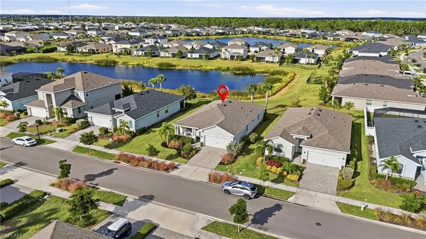 Aerial view of residential area with a large body of water