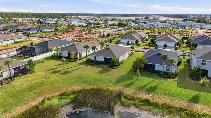 Aerial view of residential area with a nearby body of water
