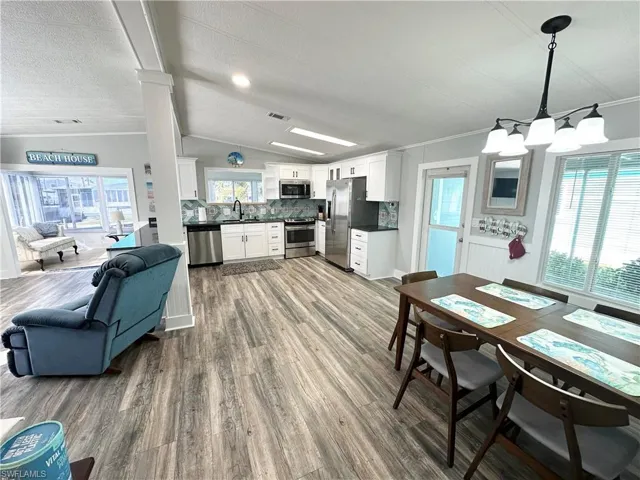 Big dining area adjacent to kitchen and living area