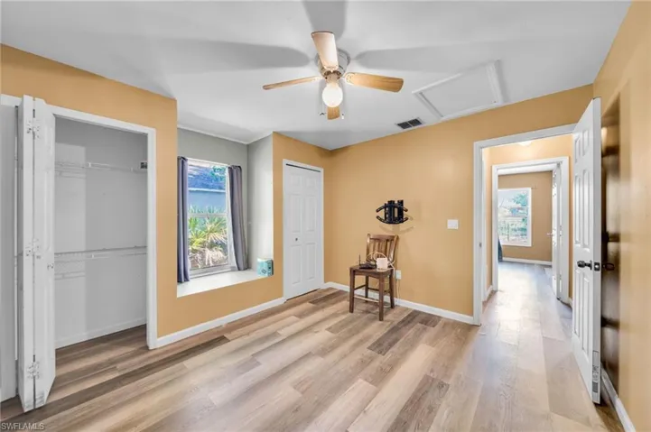 Guest Bedroom with hall to guest bathroom