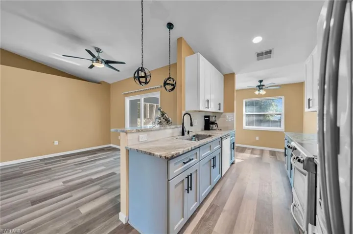 Updated Kitchen with Living Room view