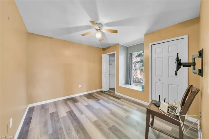 Guest Bedroom with sitting window and 2 closets