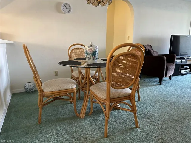 View of carpeted dining area