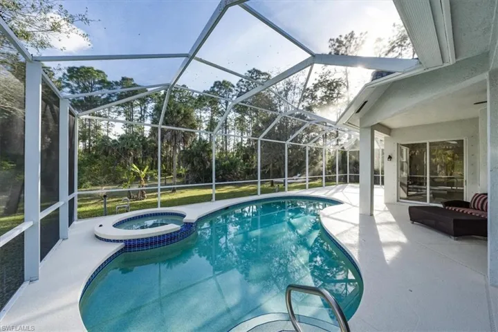 Private Screened in Lanai with beautiful Below-Ground Pool & Spa