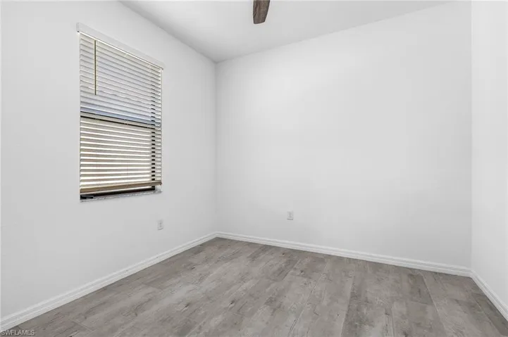 Guest room 2 with ceiling fan and large closet