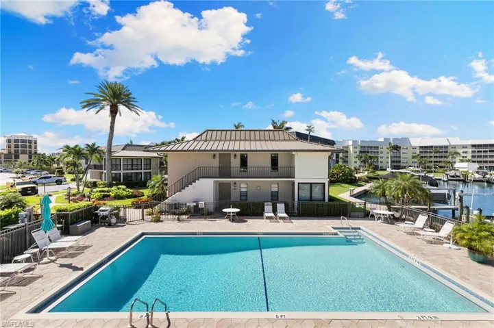 To the left of the condo, very convenient, plus a gas grill