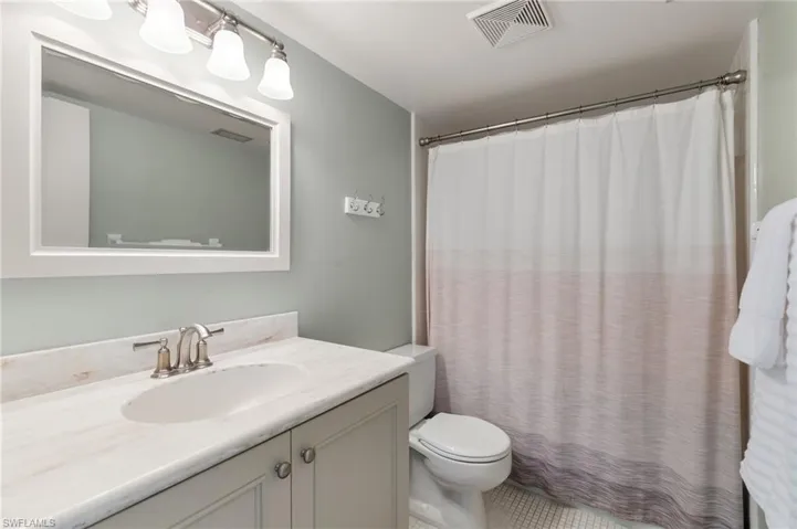Updated vanity, and tub with shower