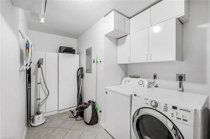 large laundry with storage