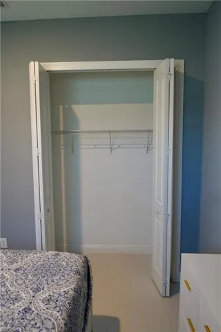 Bedroom featuring baseboards