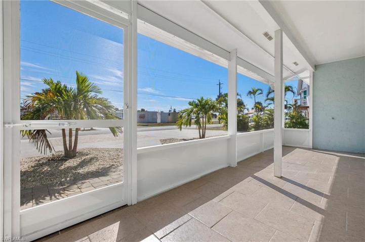 Enclosed screened-in front porch