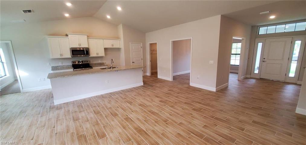 Kitchen, Dining and Entry from Family Room