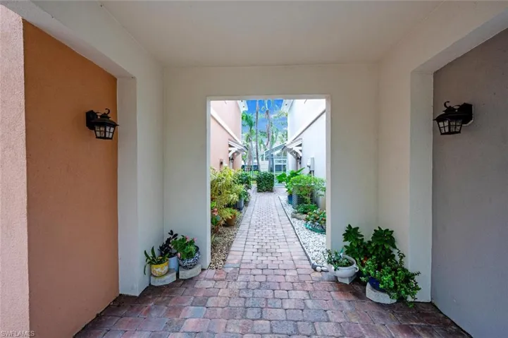 View of patio with glass enclosure