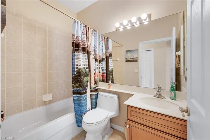 Full bathroom featuring vanity and shower / bath combo