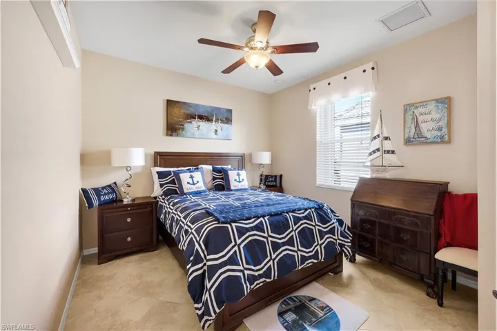 Bedroom featuring baseboards and a ceiling fan