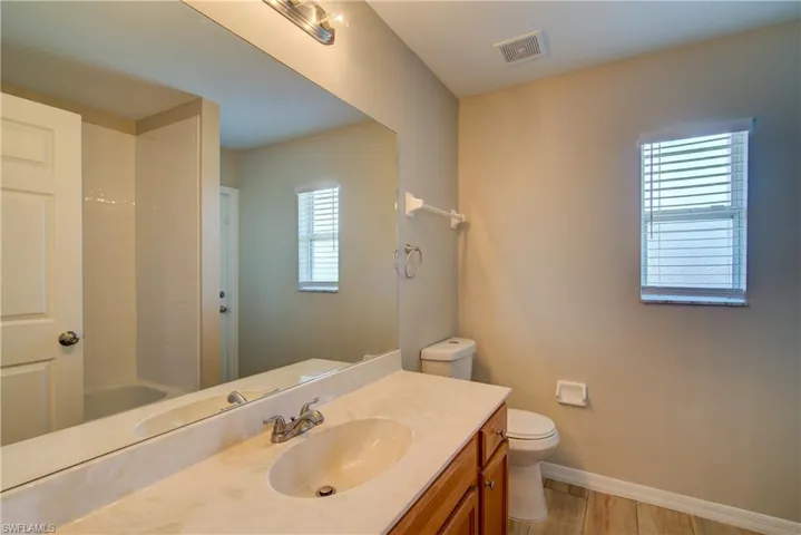 Full bathroom featuring vanity and shower / bathtub combination