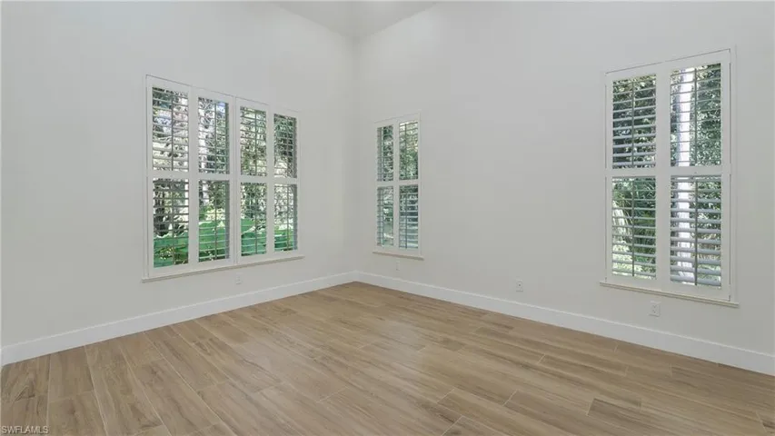 Unfurnished room featuring light wood-style floors