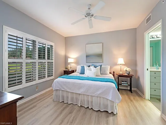 Owners Suite with LTV flooring and plantation shutters