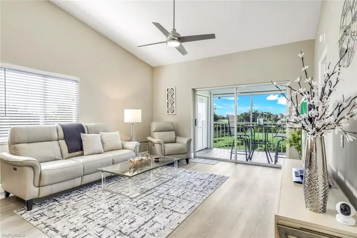 Living area with view of the golf course.