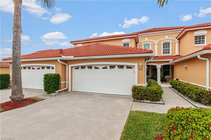 Mediterranean / spanish-style house with a garage