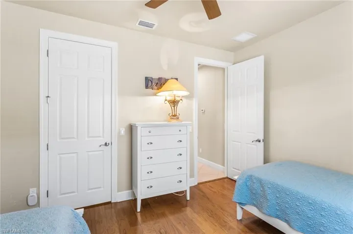Third Guest Bedroom with a walk-in closet.