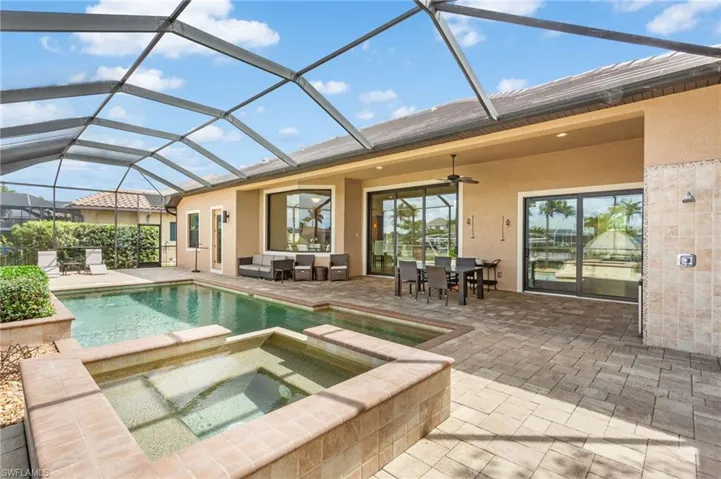View of spa, pool, and "under truss" lanai.