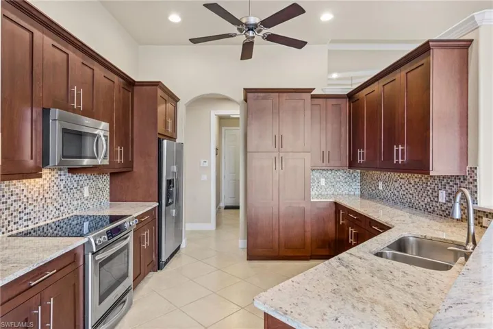 View of the kitchen with doorway to formal dining room.