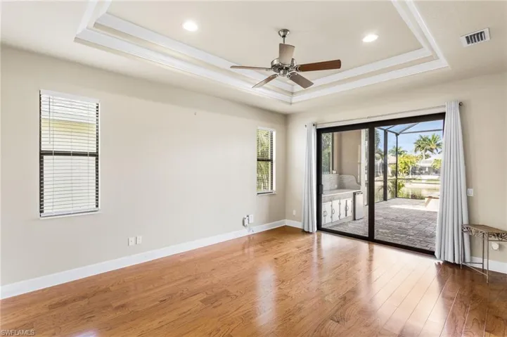 Master Bedroom with Impact Slider to Lanai.
