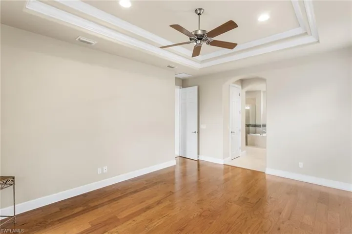 Master Bedroom with doorway to closets and Master Bath right of center.