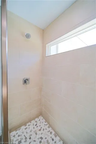 Large Tiled Shower In The Master Bathroom