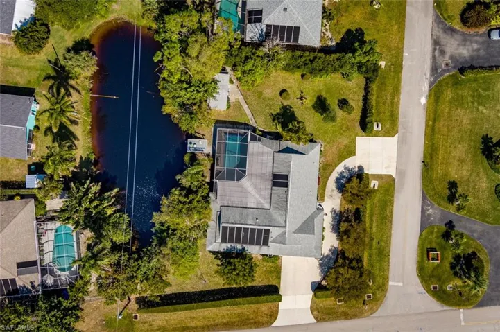 Bird's eye view of a large pond in yard