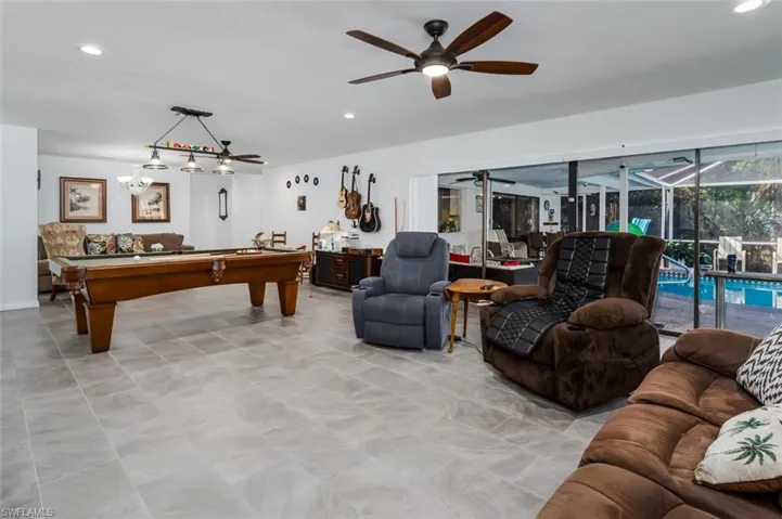 Great room with billiards table and recessed lighting
