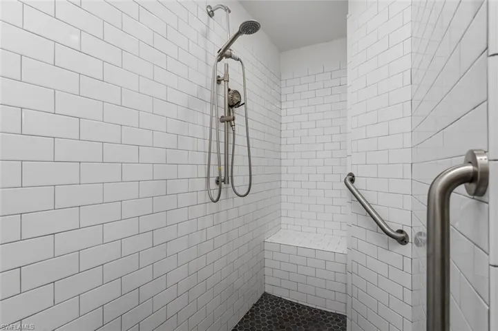 Primary Full bathroom featuring a large tile shower