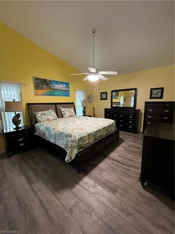 Vaulted ceiling with a flush-mount ceiling fan and light fixture