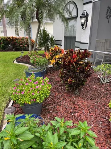 front flower beds and beautiful curved concrete curbing