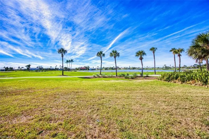 View featuring water and golf course views
