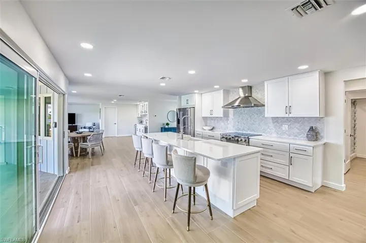 Wet bar with wine fridge and ice maker