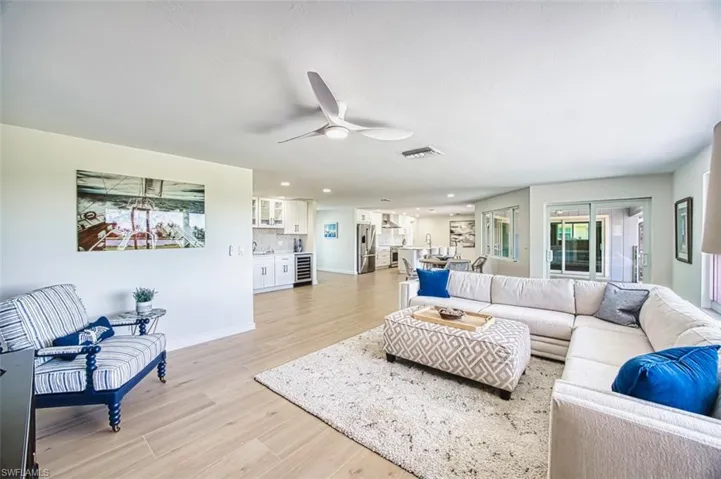 Living room with view to dining and kitchen