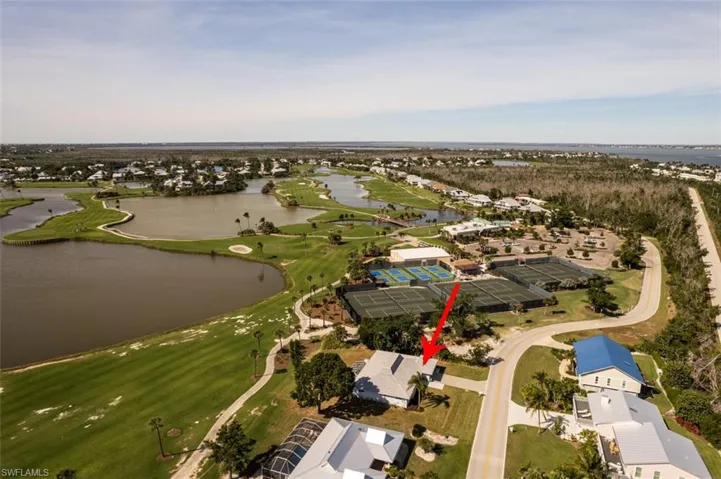 Aerial perspective of home in relation to Dune Golf & Tennis Club