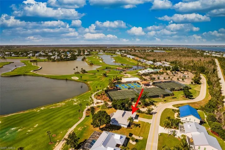 Aerial perspective of home in relation to Dune Golf & Tennis Club