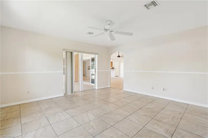 Unfurnished room featuring ceiling fan