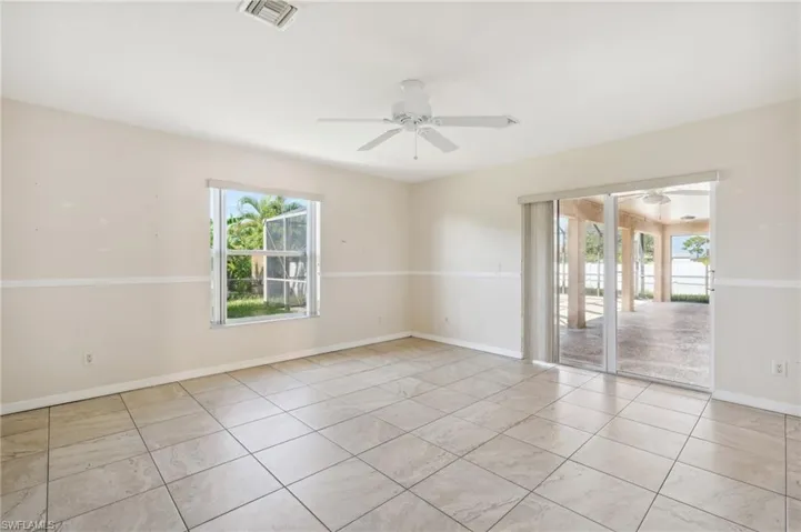 Unfurnished room featuring ceiling fan