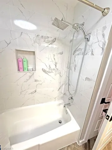 Full bathroom featuring shower / bath combination