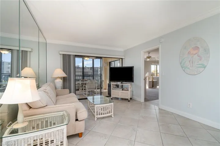 Living Room looking onto large lanai.