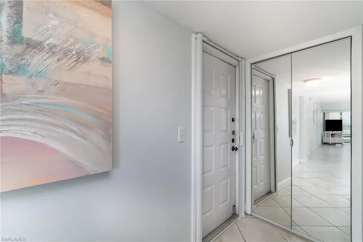 Entryway with retractable screen to enjoy the SW FL breeze.