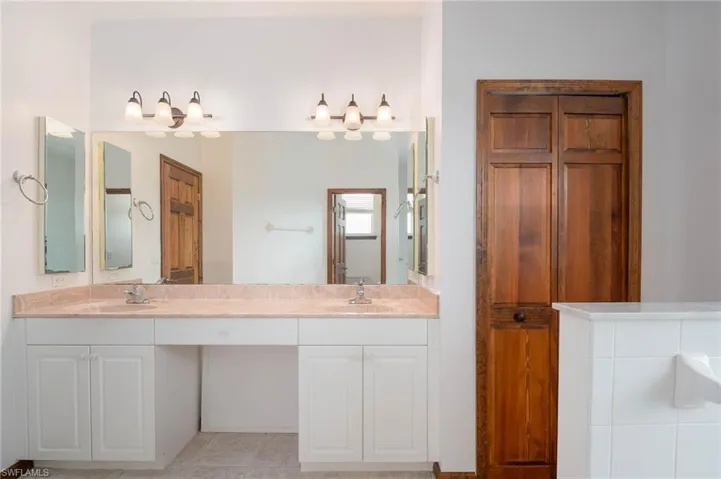 Full bathroom with double vanity