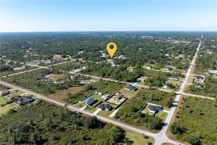 View of property location featuring nearby suburban area