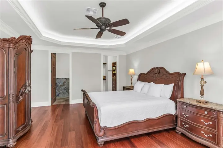 2nd bedroom with ensuite bathroom with walk in shower and walk in closet